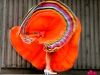 Jacqueline Lopez, 13, of Kentwood swirls her dress while performing with Grupo Tarasco of the Cook Arts Center on Thursday, September 2 during the Stand Up for Rosa Parks dedication ceremony at Rosa Parks Circle in Grand Rapids.