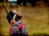 Tonesha Love, 8, of Kellogsville takes a deep breath and sighs on the swings at John Ball Park in Grand Rapids while enjoying her day off from school with brother LaMont, 10, and sister Tony, 12.  \'It\'s tricky weather,\