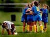 Kearsley womens varsity soccer team players cheer after scoring their single goal against Davison during the Big Nine Conference girls soccer tournament Wednesday evening at Davison High School.