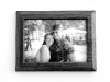 A picture of Heather Lovell and her boyfriend Josh Hoffman hangs in their Middleville home on Wednesday, March 4, 2009 before Hoffman was shot in the neck while serving in Iraq.  \
