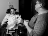 Hoffman laughs with SLP Beth Pearce after successfully swallowing applesauce in speech therapy at Mary Free Bed Rehabilitation Hospital. Hoffman attends therapy twice a week, working to swallow and make speaking noises.(Emily Zoladz | The Grand Rapids Press)