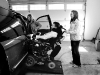 Lovell helps Hoffman into their van on the way to speech therapy. \